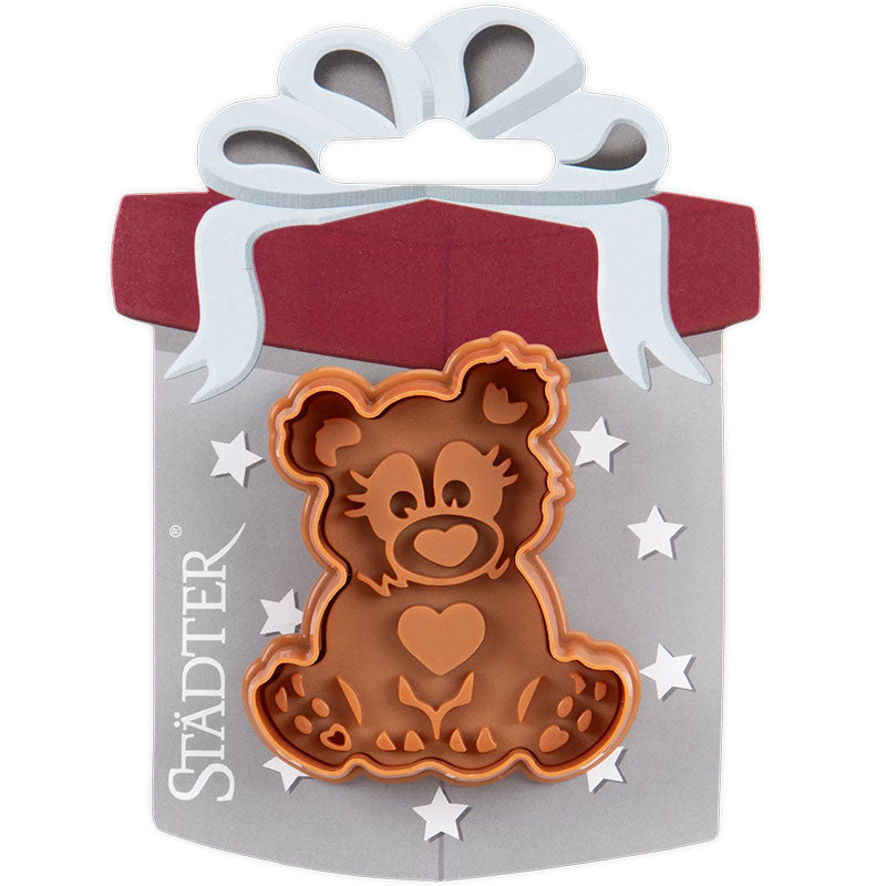 Keksstempel Bär , ca 6 cm in der Farbe braun, der Bär hat ein Herz als Nase und der Stempel funktioniert durch drücken des Hebels, dadurch wird der Bär auf den Teig gepresst und an der Seite direkt ausgeschnitten.