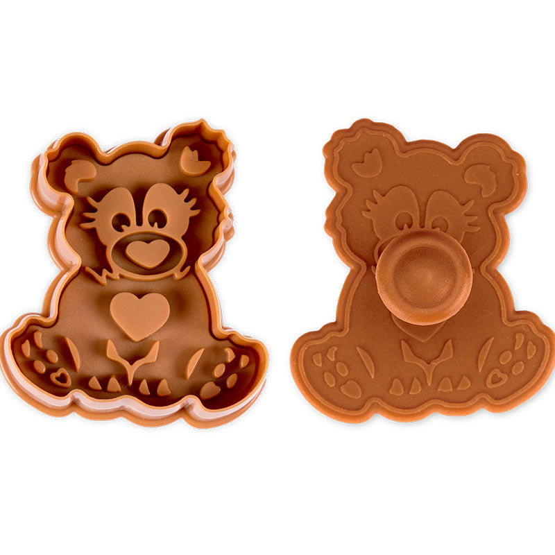 Keksstempel Bär , ca 6 cm in der Farbe braun, der Bär hat ein Herz als Nase und der Stempel funktioniert durch drücken des Hebels, dadurch wird der Bär auf den Teig gepresst und an der Seite direkt ausgeschnitten.