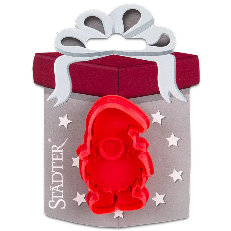 Keksstempel Wichtel, ca 6 cm in der Farbe rot, der Stempel funktioniert durch drücken des Hebels, dadurch wird das Motiv auf den Teig gepresst und an der Seite direkt ausgeschnitten.